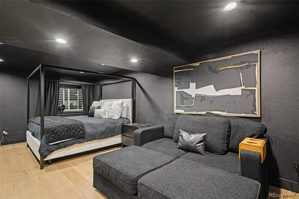 a bedroom with bed and window