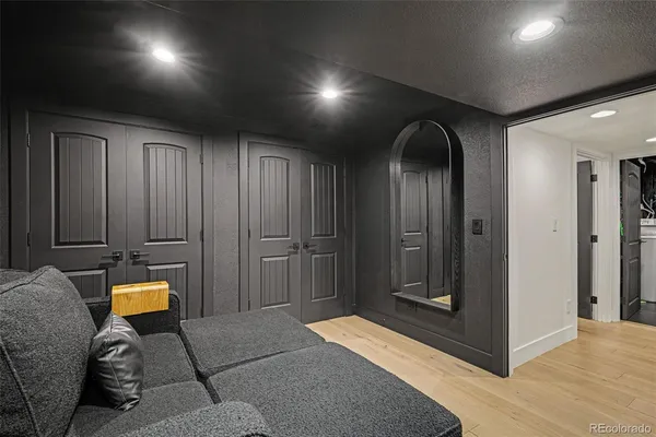 a view of hall way with bathroom