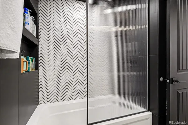 a bathroom with a bathtub