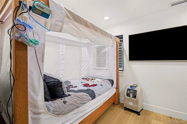 a living room with a couch and a flat screen tv