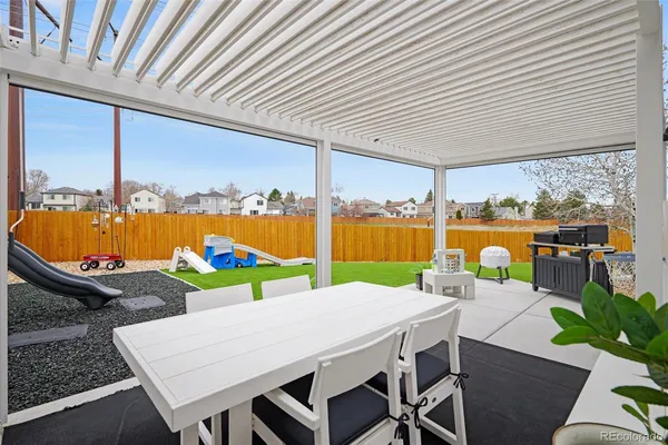 an outdoor space with furniture