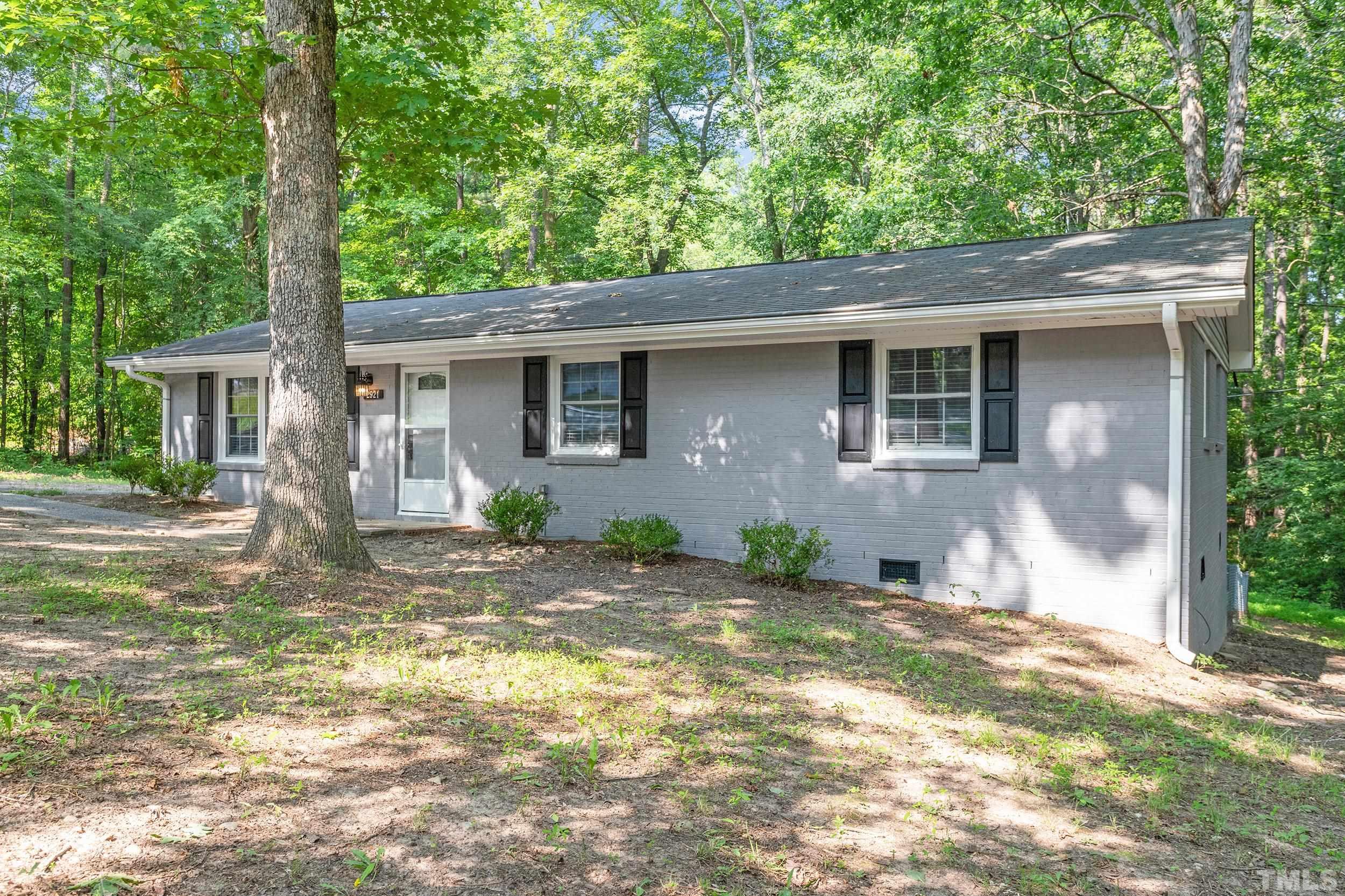 2921 Darrow Road Durham, NC 27704 - Photo 2 of 32 a view of a house with a yard