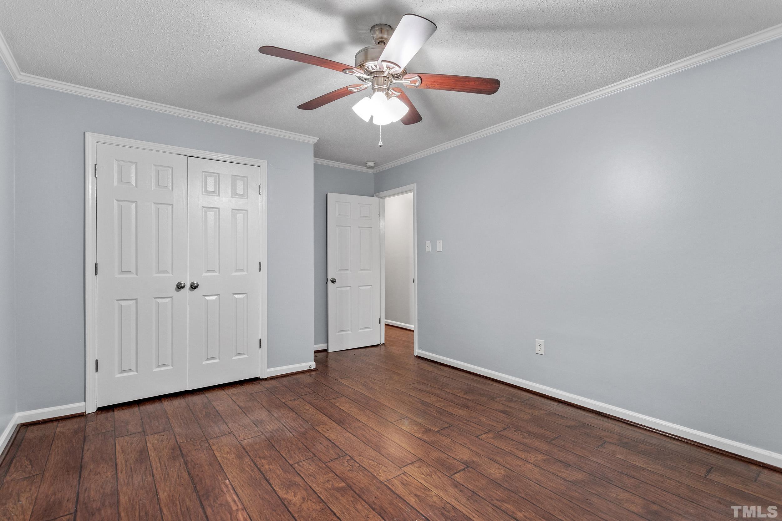 2921 Darrow Road Durham, NC 27704 - Photo 31 of 32 a view of an empty room with wooden floor