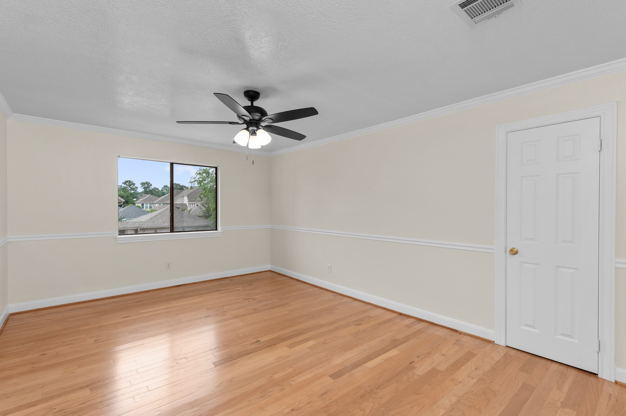 17402 Wilton Park Court Spring, TX 77379 - Photo 46 of 50 wooden floor in an empty room with a window