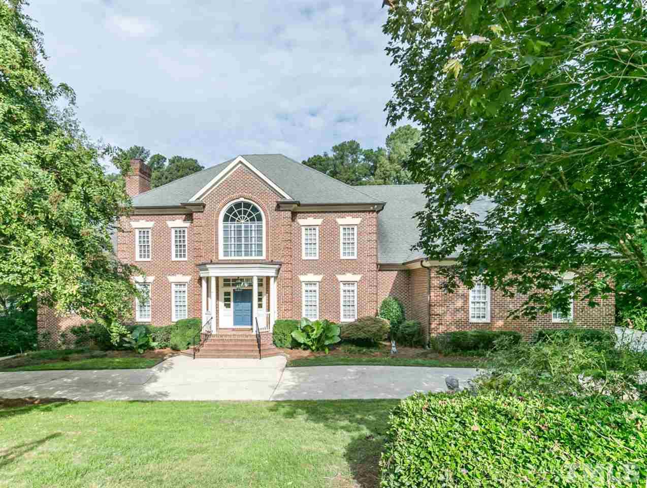 a front of a house with a yard