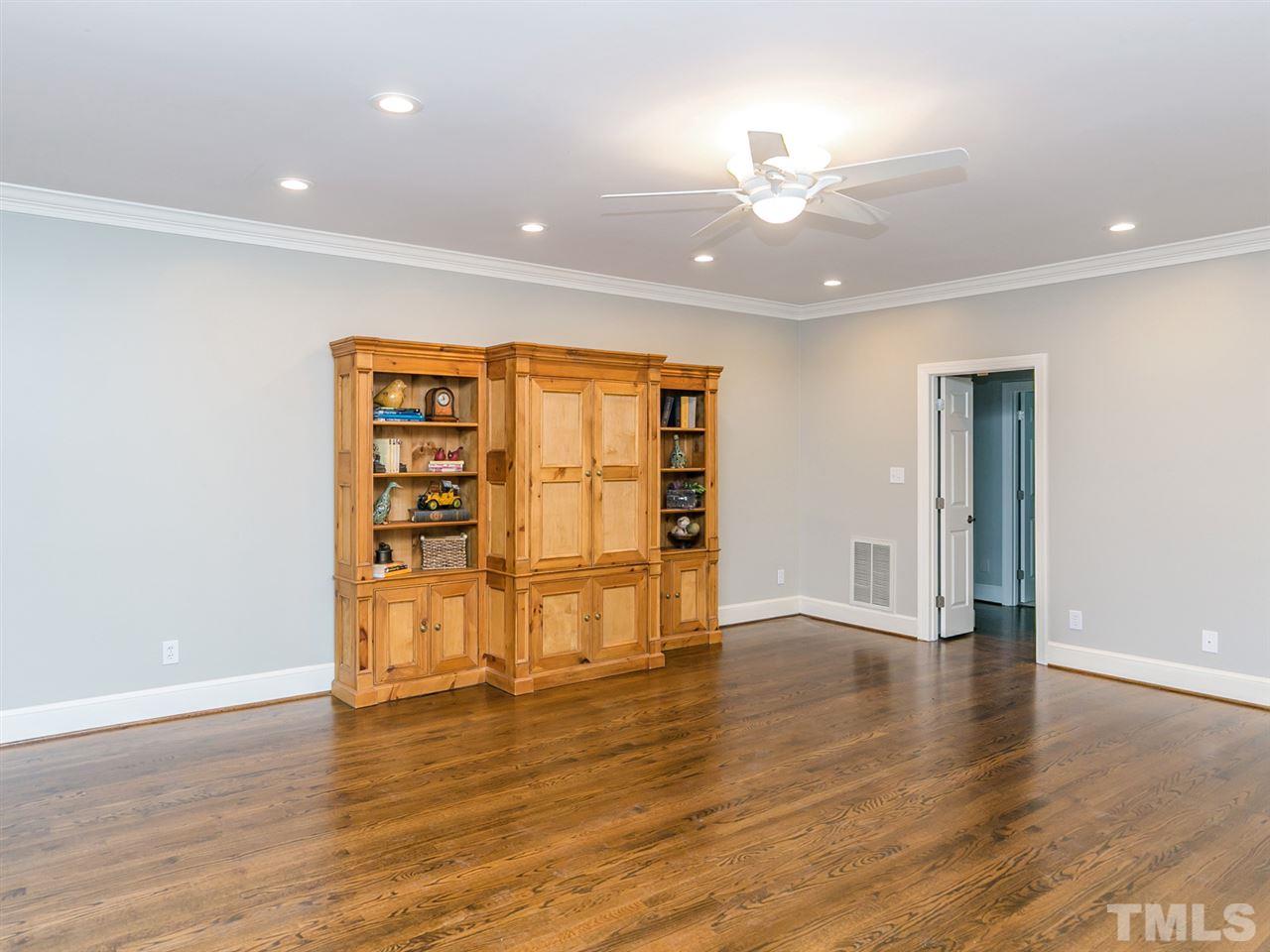 4038 John S Raboteau Wynd Raleigh, NC 27612 - Photo 12 of 25 a view of empty room with wooden floor