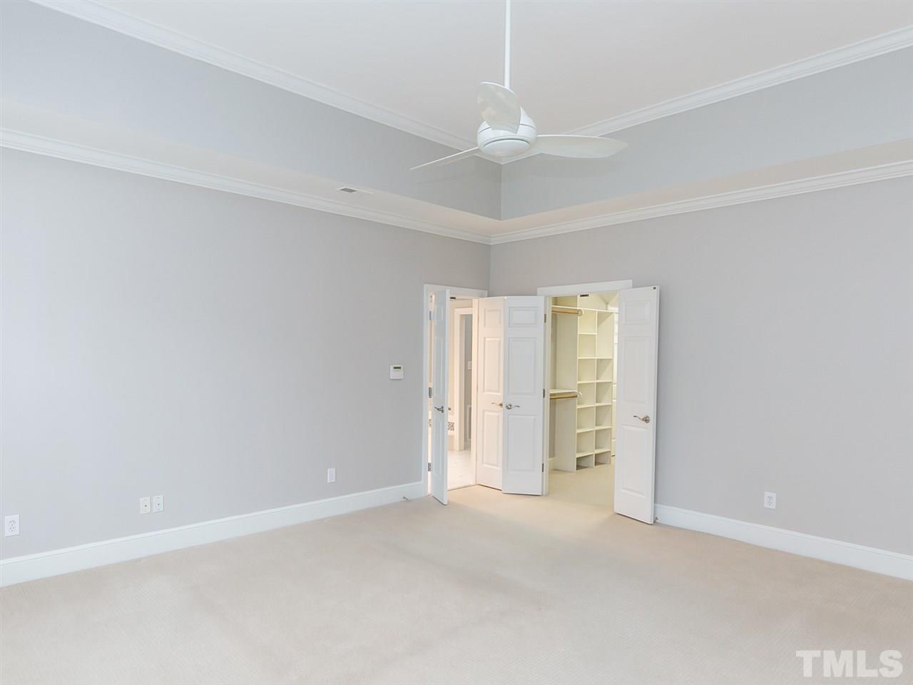 4038 John S Raboteau Wynd Raleigh, NC 27612 - Photo 14 of 25 a view of an empty room