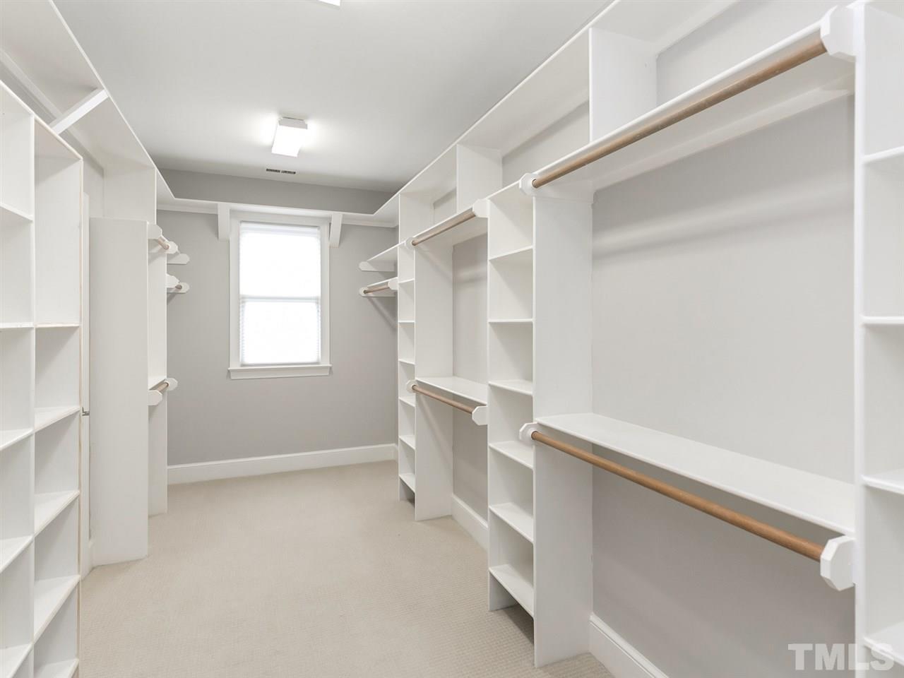 4038 John S Raboteau Wynd Raleigh, NC 27612 - Photo 15 of 25 a view of an empty room with a window