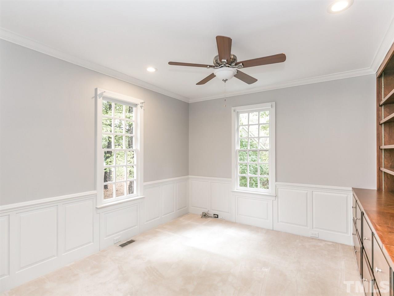 4038 John S Raboteau Wynd Raleigh, NC 27612 - Photo 18 of 25 a view of an empty room with a window
