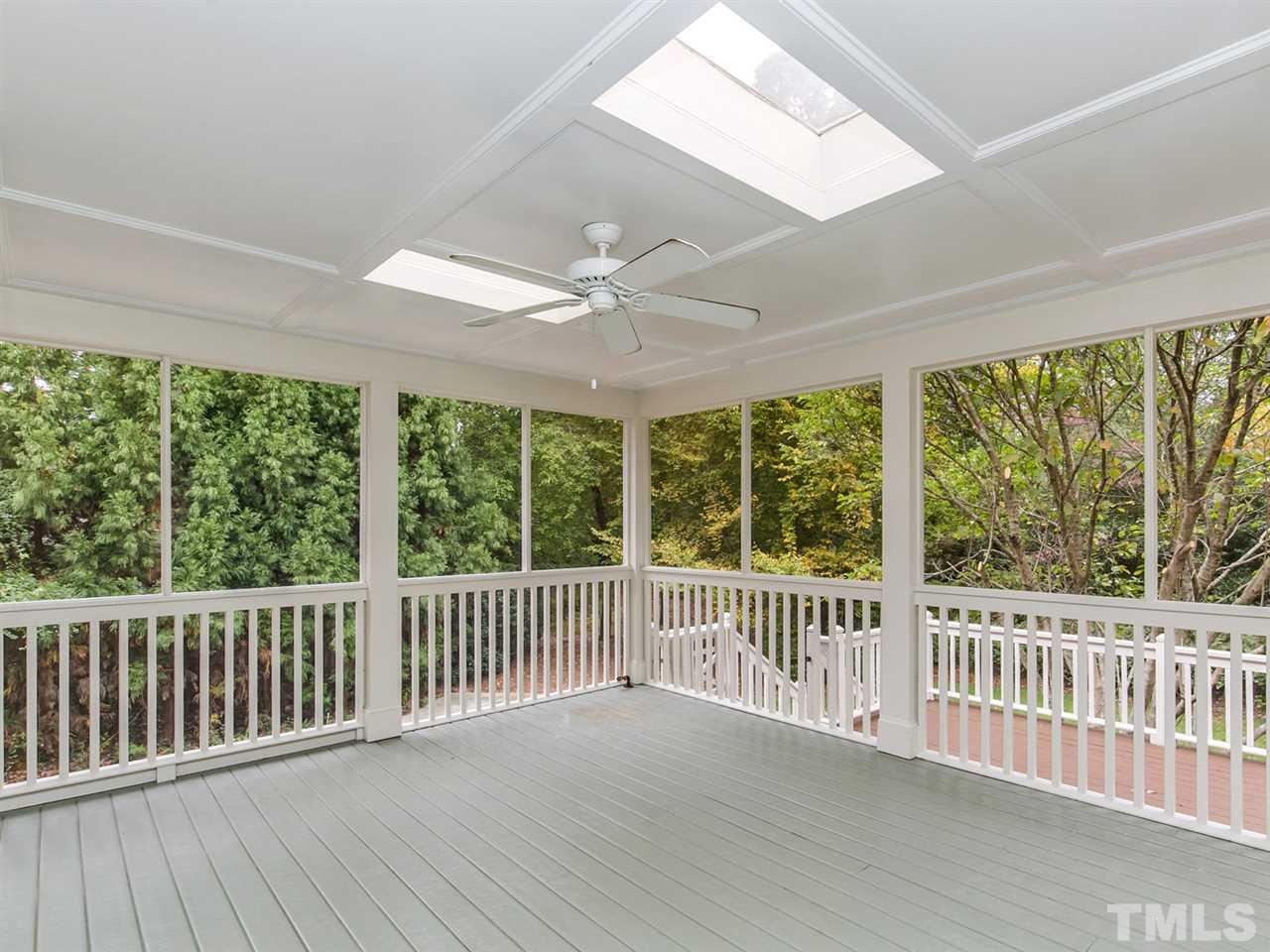 4038 John S Raboteau Wynd Raleigh, NC 27612 - Photo 20 of 25 an empty room with wooden floor and windows