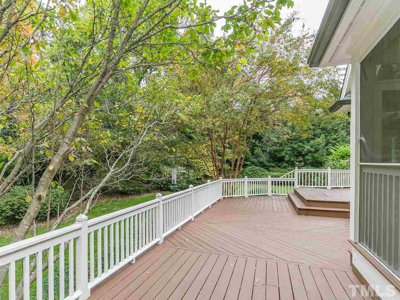 4038 John S Raboteau Wynd Raleigh, NC 27612 - Photo 21 of 25 a view of a balcony with chairs