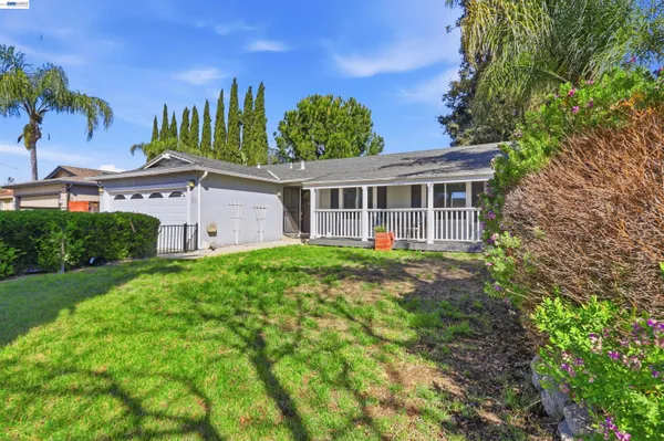 a view of a house with a garden