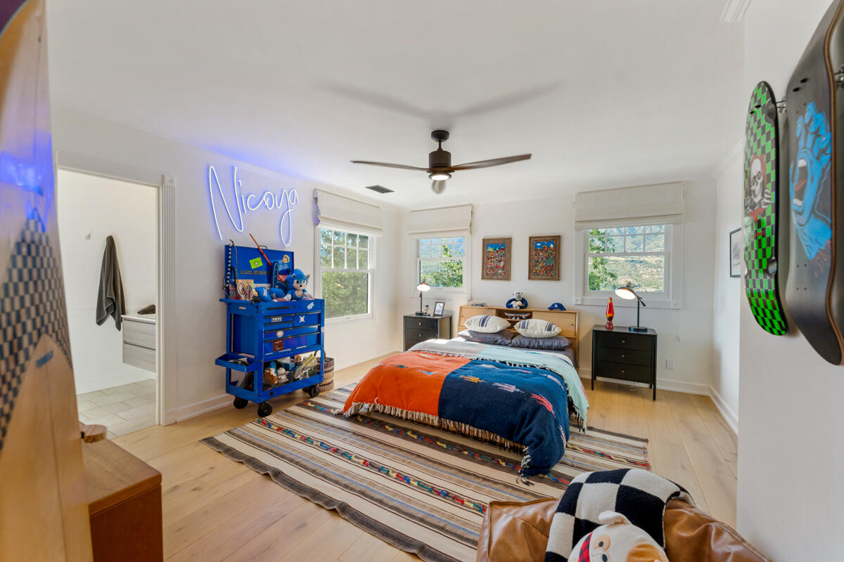 13100 Ojai Road Santa Paula, CA 93060 - Photo 30 of 60 a bedroom with a bed and a tv