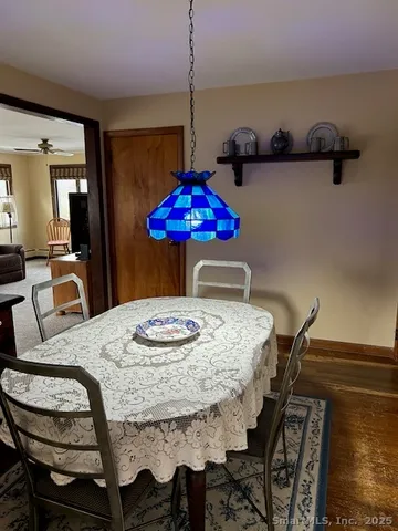 a view of a dining room with furniture