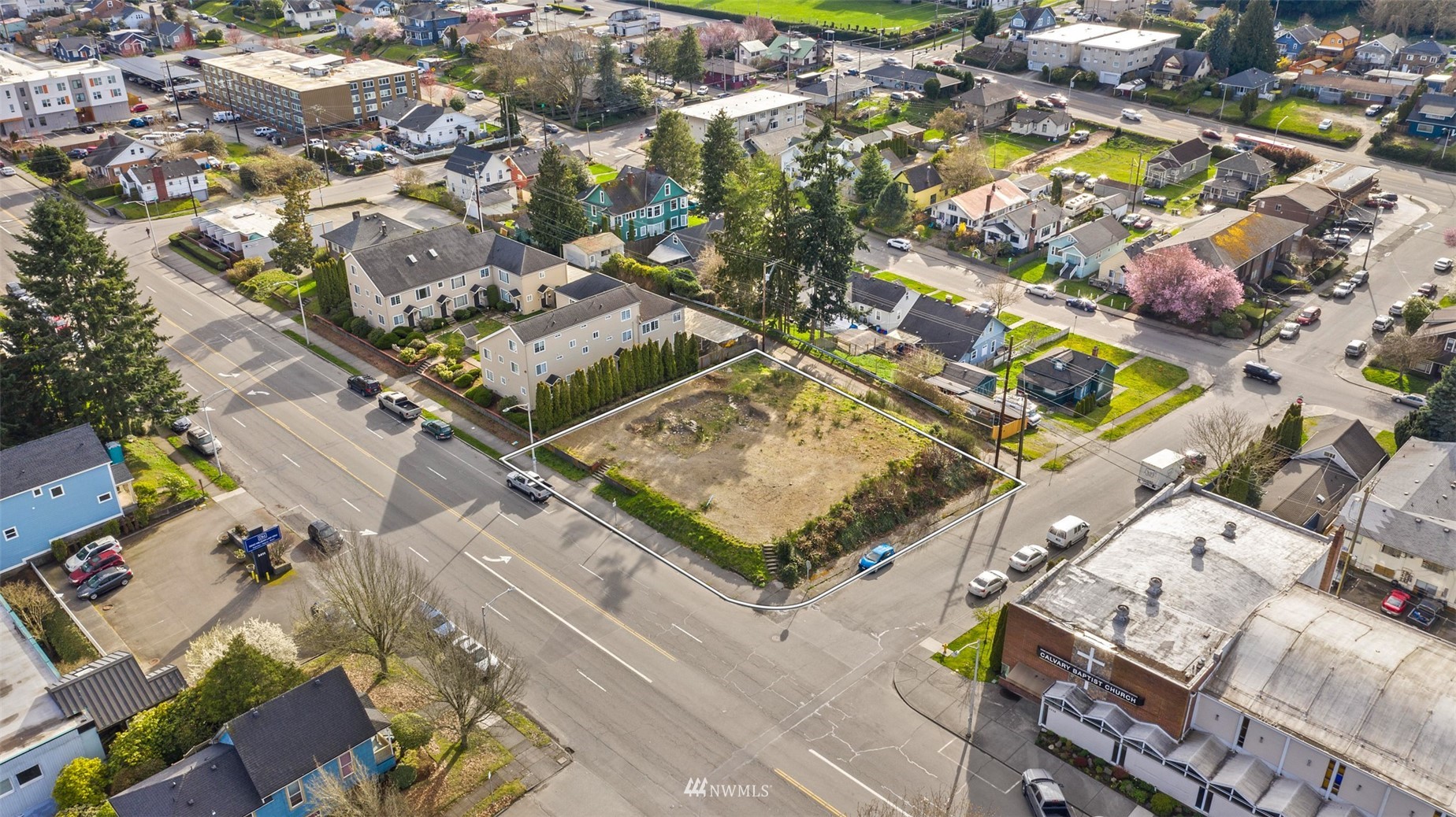 3402 Colby Avenue Everett, WA 98201 - Photo 2 of 12 an aerial view of residential houses with outdoor space