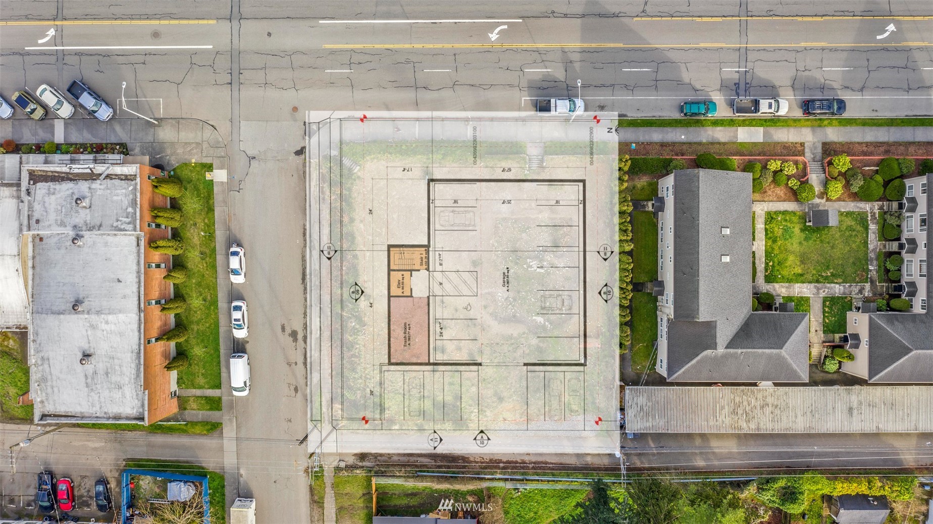 3402 Colby Avenue Everett, WA 98201 - Photo 10 of 12 a kitchen with stainless steel appliances kitchen island granite countertop a refrigerator and a stove