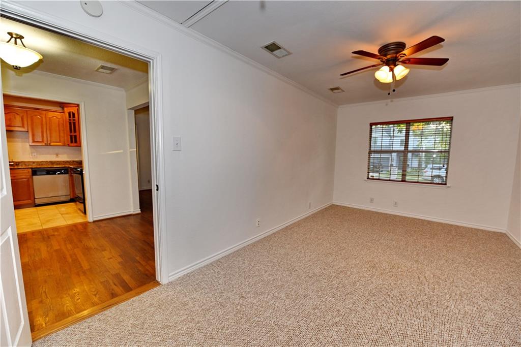 8502 Ridgelea Street Dallas, TX 75209 - Photo 22 of 37 a view of an empty room with a window