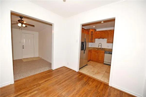 a view of a bathroom with sink and mirror