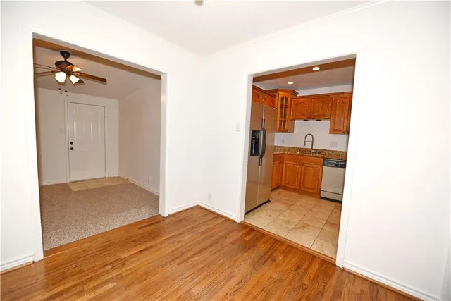 a view of a bathroom with sink and mirror