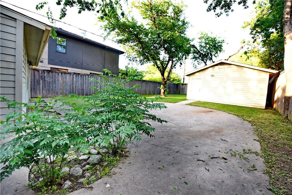 8502 Ridgelea Street Dallas, TX 75209 - Photo 3 of 37 a view of a back yard of the house