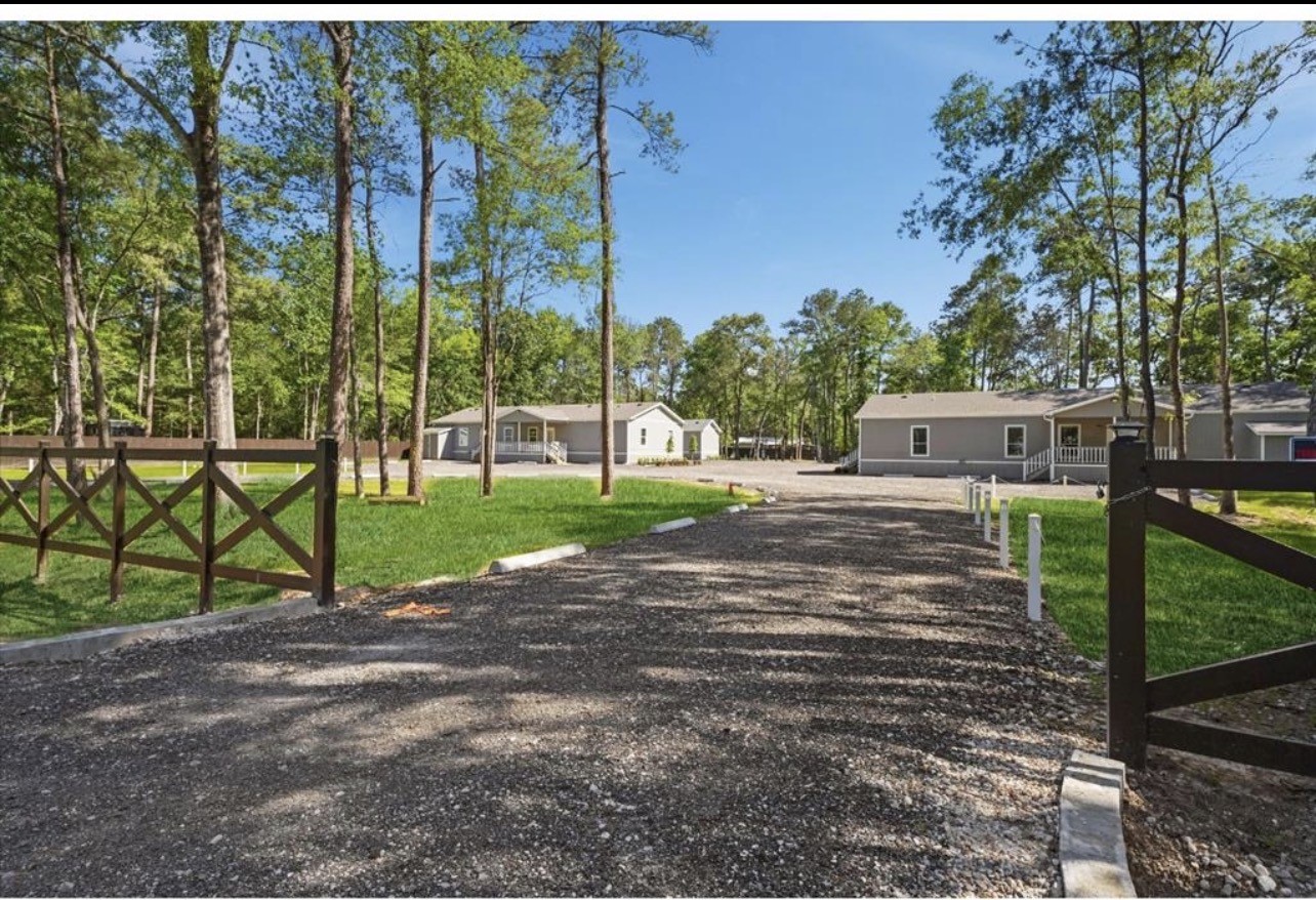 20774 Stevens New Caney, TX 77357 - Photo 2 of 7 a view of a park with large trees