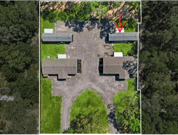 an aerial view of house with outdoor space