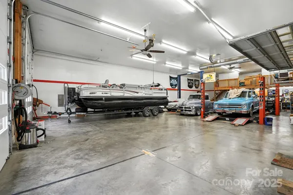 a view of cars parked in a garage