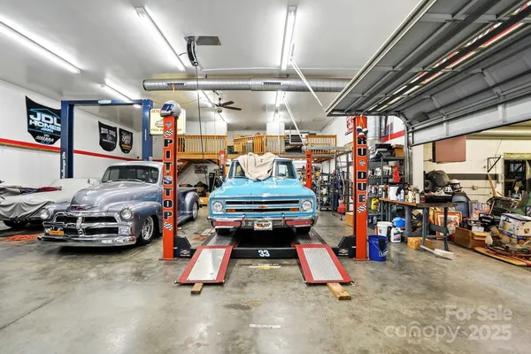a utility room with lot of table and chairs