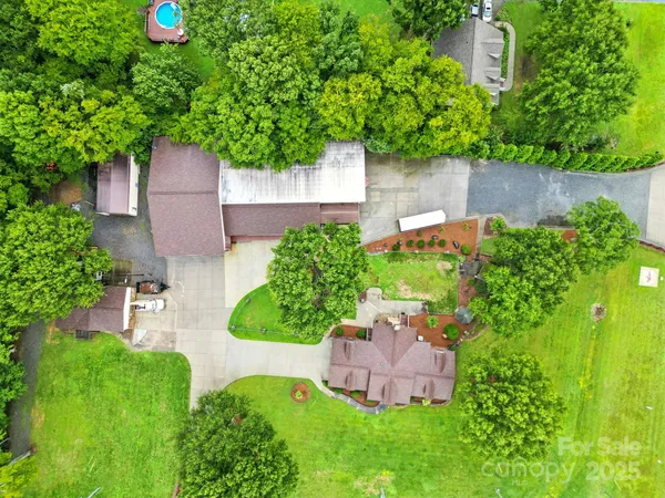 a backyard of a house with lots of green space
