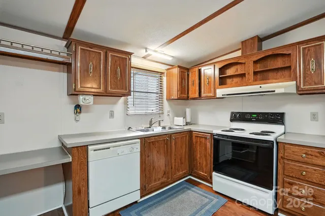 a very nice looking room with a ceiling fan and a window