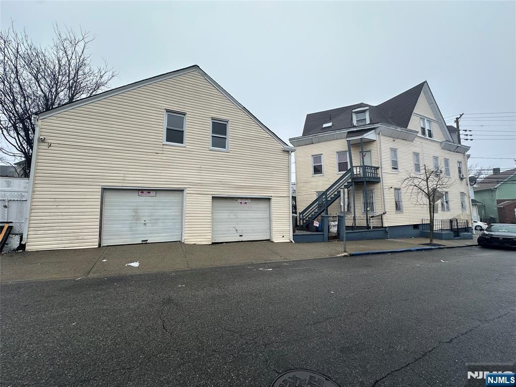 95-99 Lyon Street Paterson, NJ 07524 - Photo 2 of 3 a view of a house with a street