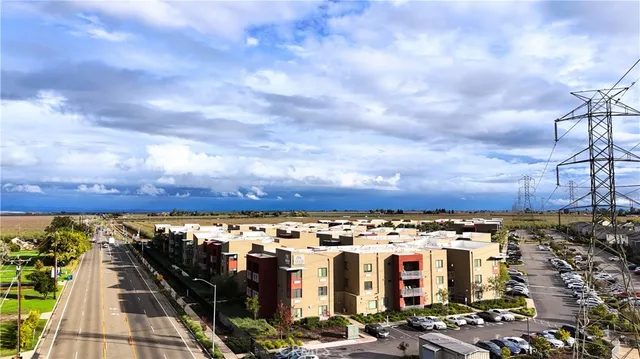 an aerial view of city and lake