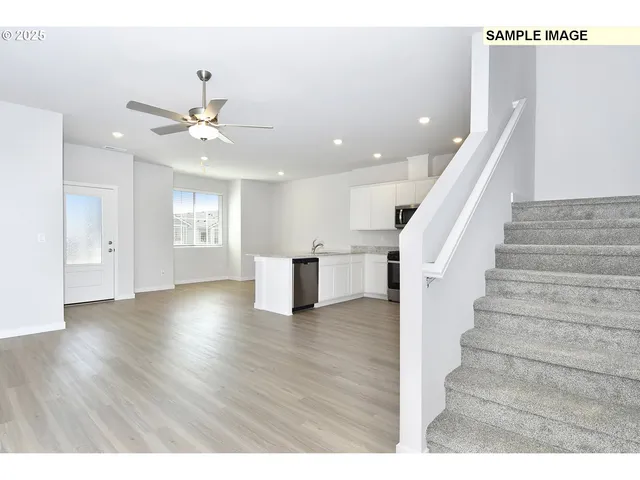 a view empty an entryway with wooden floor
