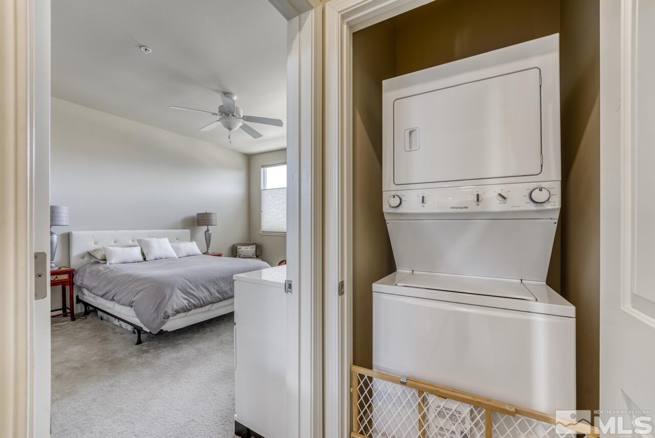 2490 Eastshore Place, Unit 208 Reno, NV 89509 - Photo 19 of 36 a en suite bathroom with a toilet and a mirror