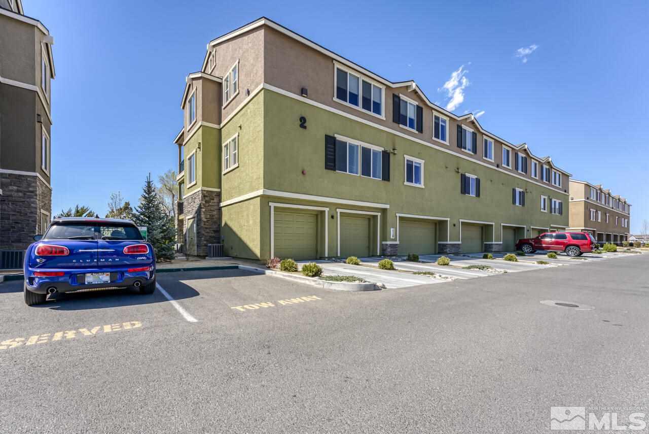 2490 Eastshore Place, Unit 208 Reno, NV 89509 - Photo 32 of 36 a car parked in front of a building