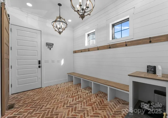 a view of a hallway with entryway