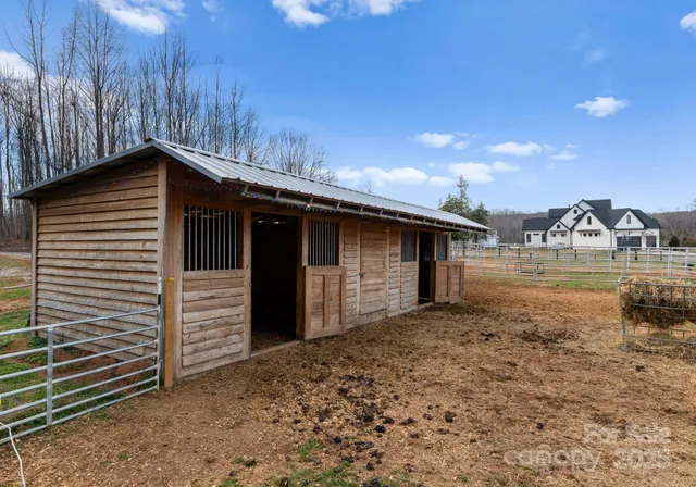 a view of a balcony with chairs