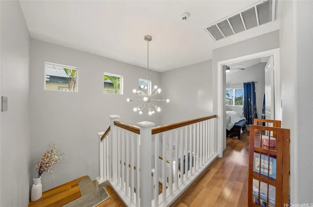 a view of a hallway with kids bedroom