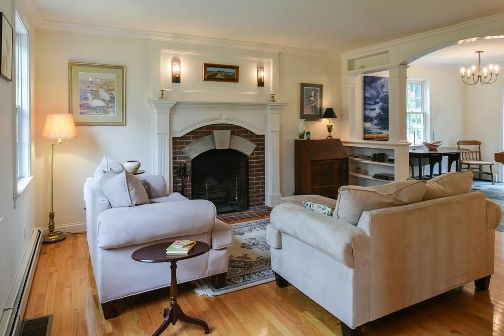 153 Kimball Road Amesbury, MA 01913 - Photo 4 of 17 a living room with furniture and a fireplace