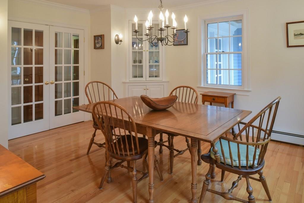 153 Kimball Road Amesbury, MA 01913 - Photo 6 of 17 a view of a dining room with furniture and chandelier