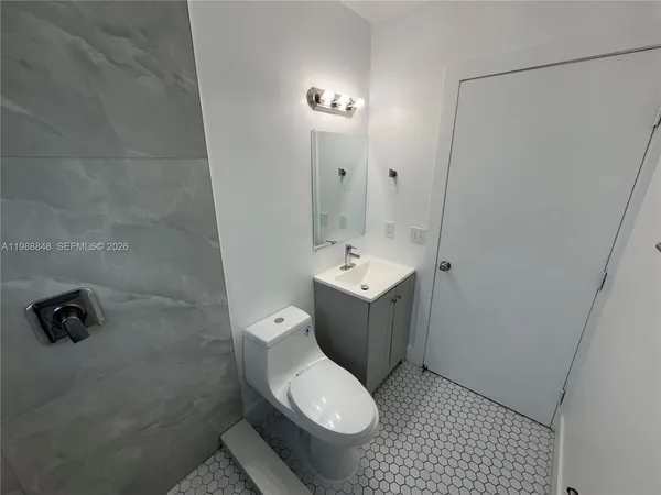 a view of an empty room and window