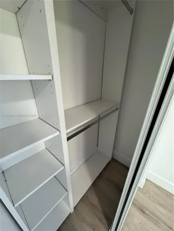 a view of a balcony with chairs