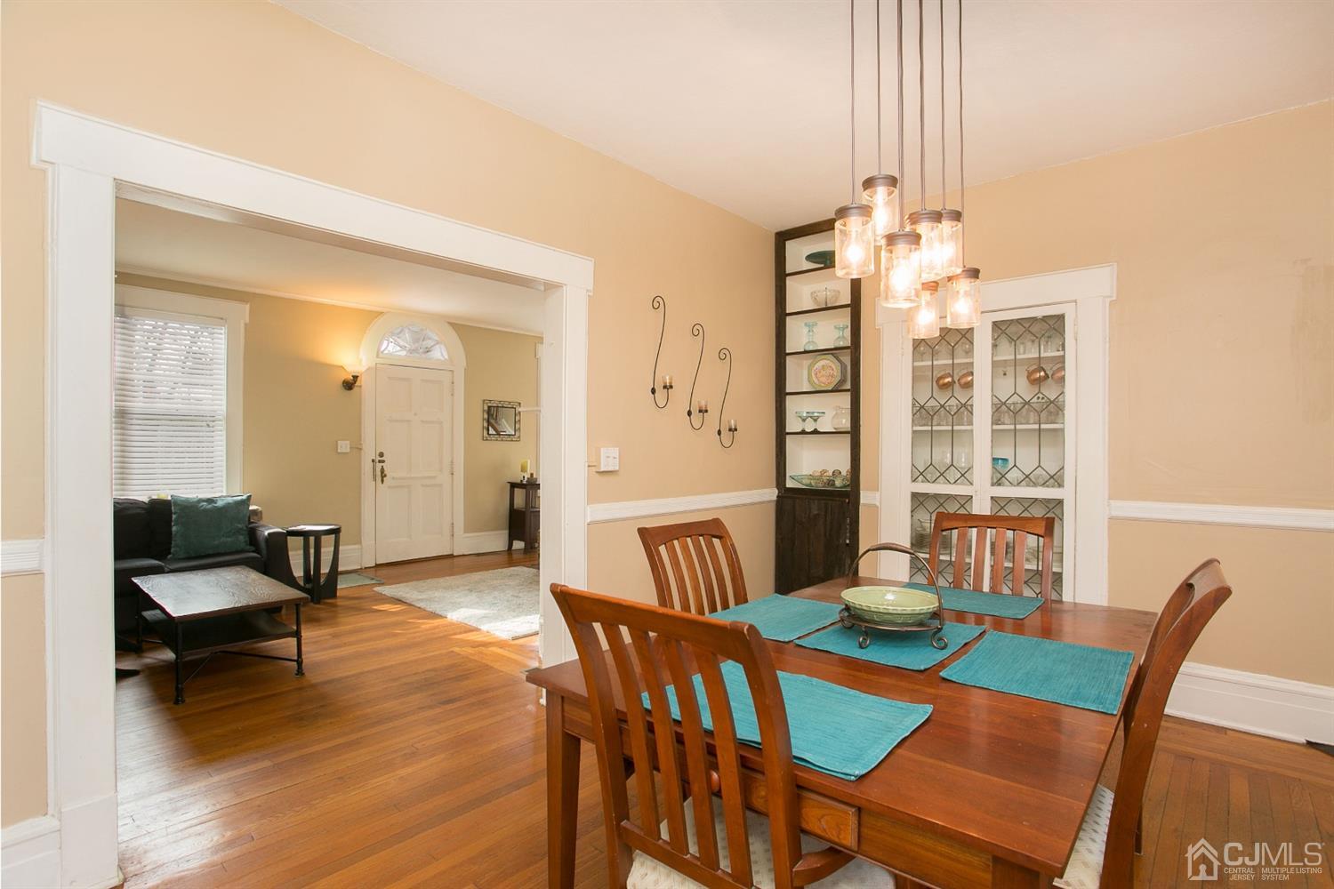 68 Rector Street Metuchen, NJ 08840 - Photo 11 of 40 a view of a dining room with furniture and wooden floor