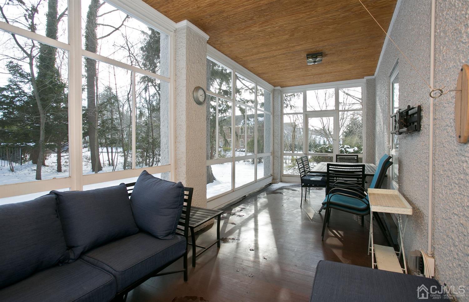68 Rector Street Metuchen, NJ 08840 - Photo 17 of 40 a living room with furniture and a large window