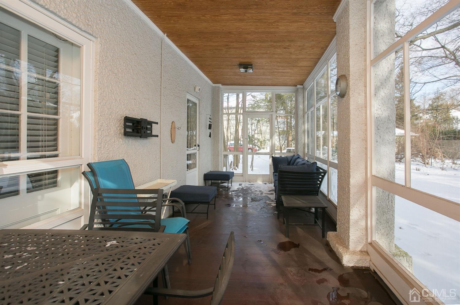 68 Rector Street Metuchen, NJ 08840 - Photo 18 of 40 a living room with furniture and a large window