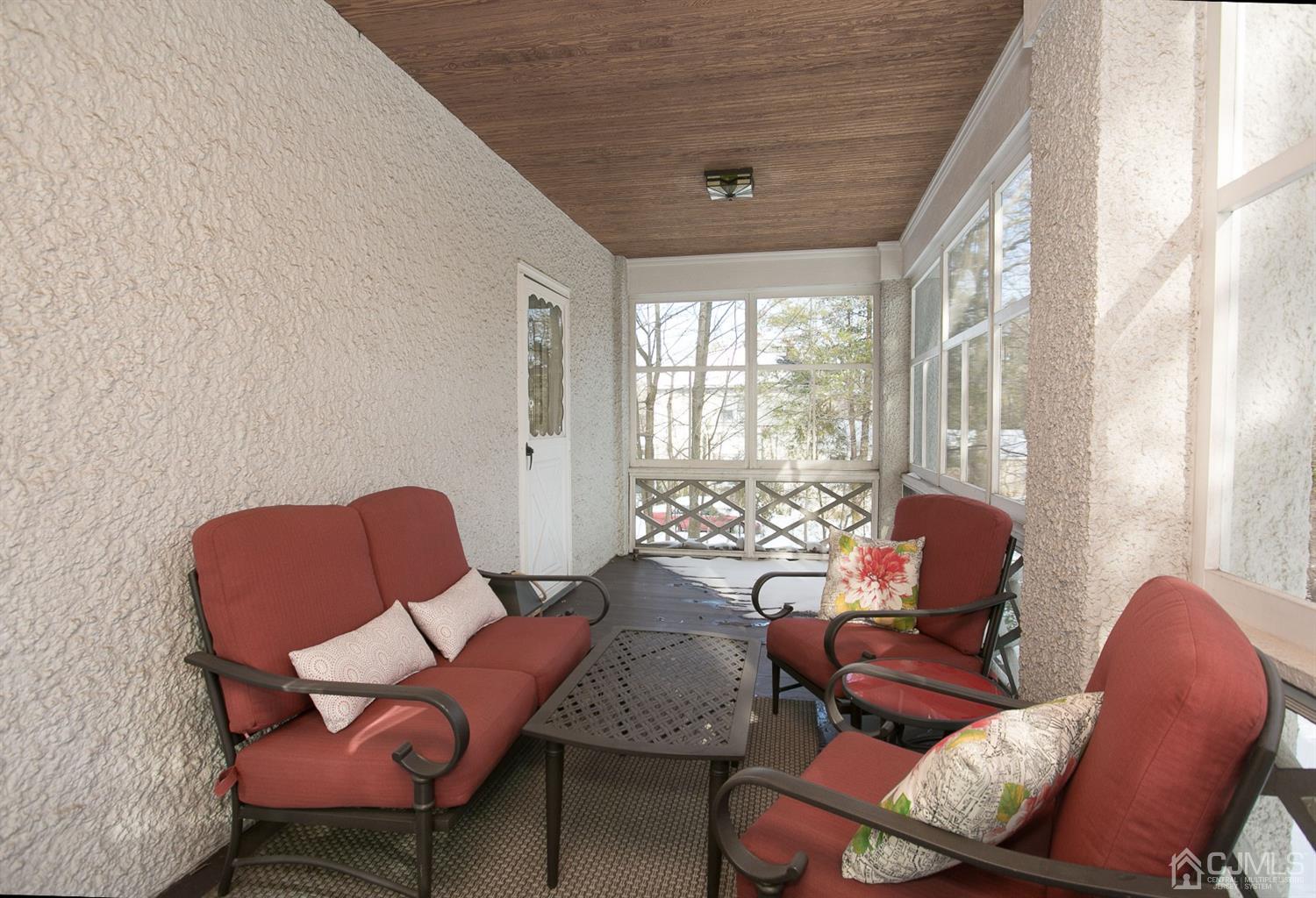 68 Rector Street Metuchen, NJ 08840 - Photo 21 of 40 a living room with furniture and a large window
