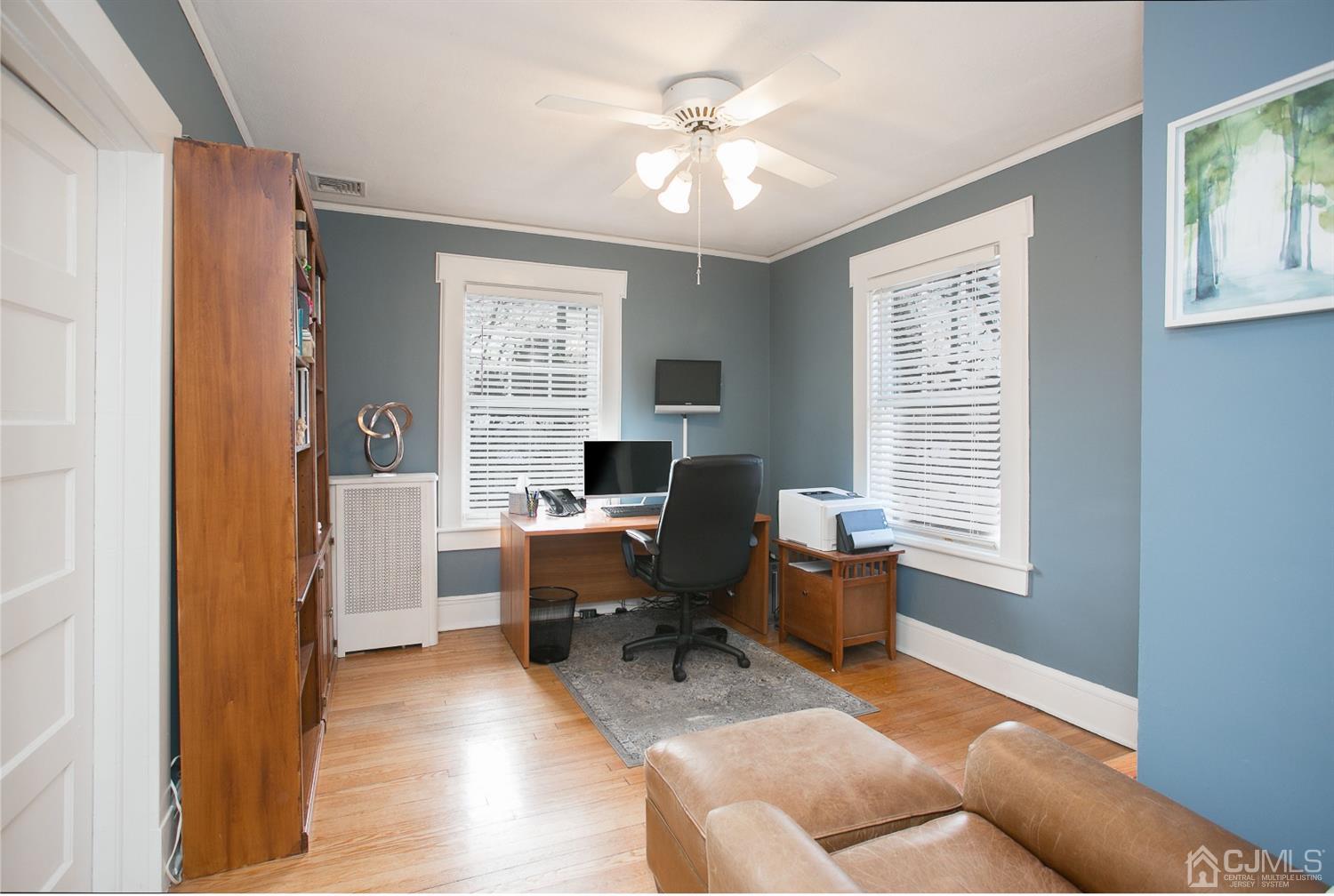 68 Rector Street Metuchen, NJ 08840 - Photo 24 of 40 a living room with furniture and a window