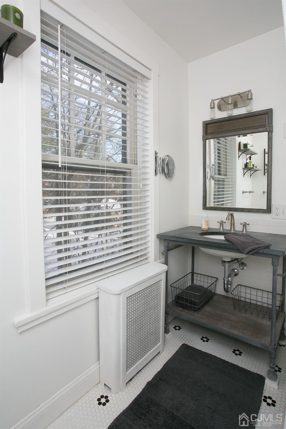 68 Rector Street Metuchen, NJ 08840 - Photo 28 of 40 a view of a room that has a bench and chair