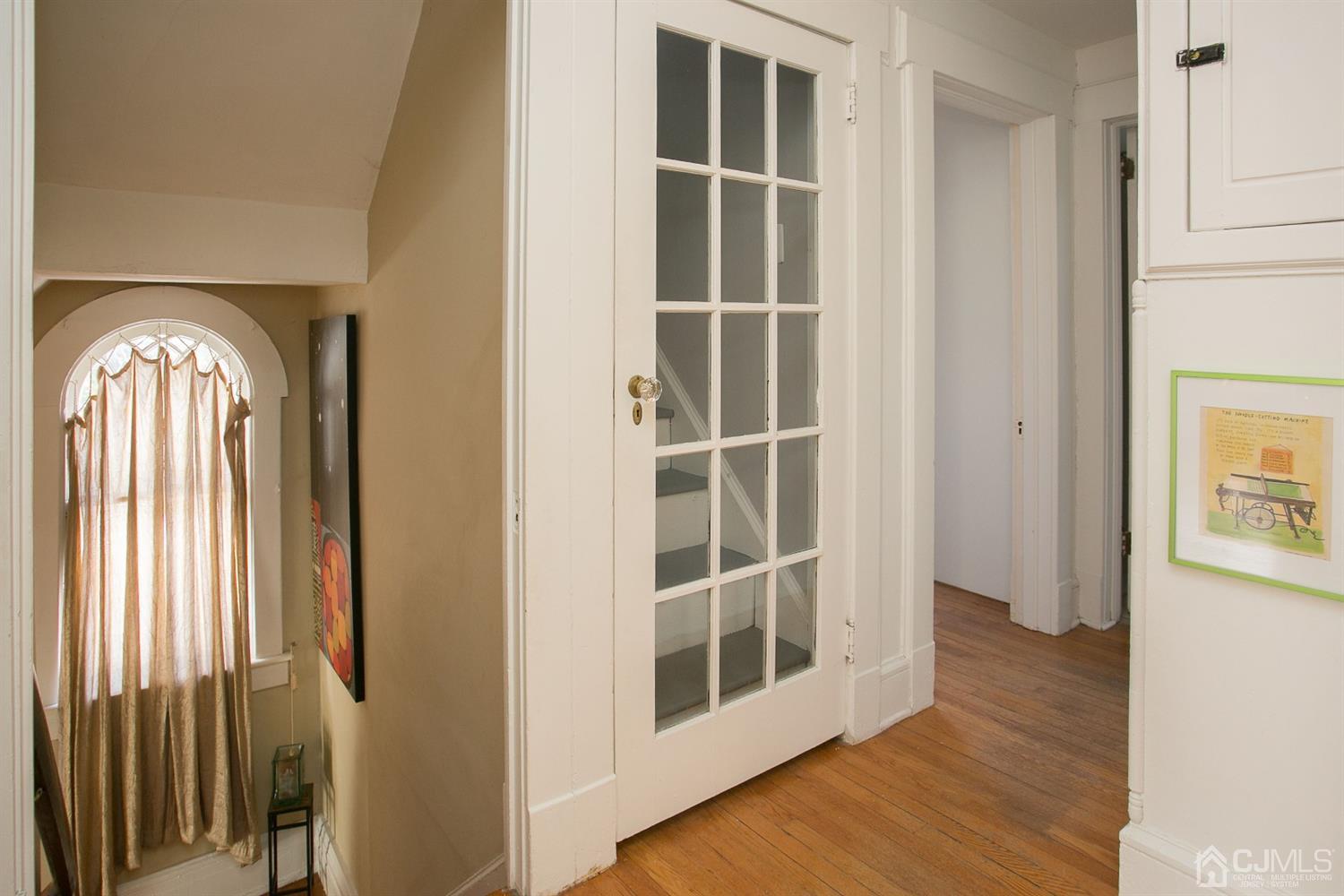 68 Rector Street Metuchen, NJ 08840 - Photo 29 of 40 a view of an entryway with wooden floor and door