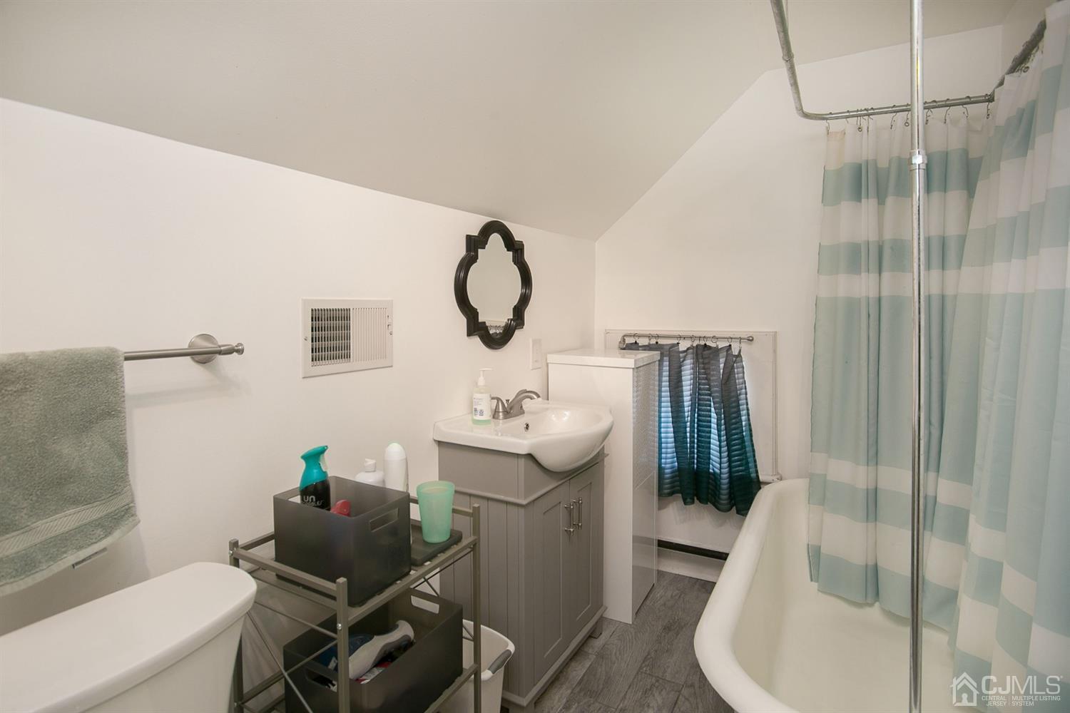 68 Rector Street Metuchen, NJ 08840 - Photo 34 of 40 a bathroom with a sink toilet and shower